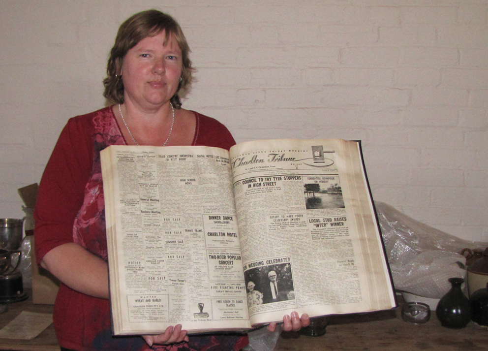 Photo of a woman holding a book